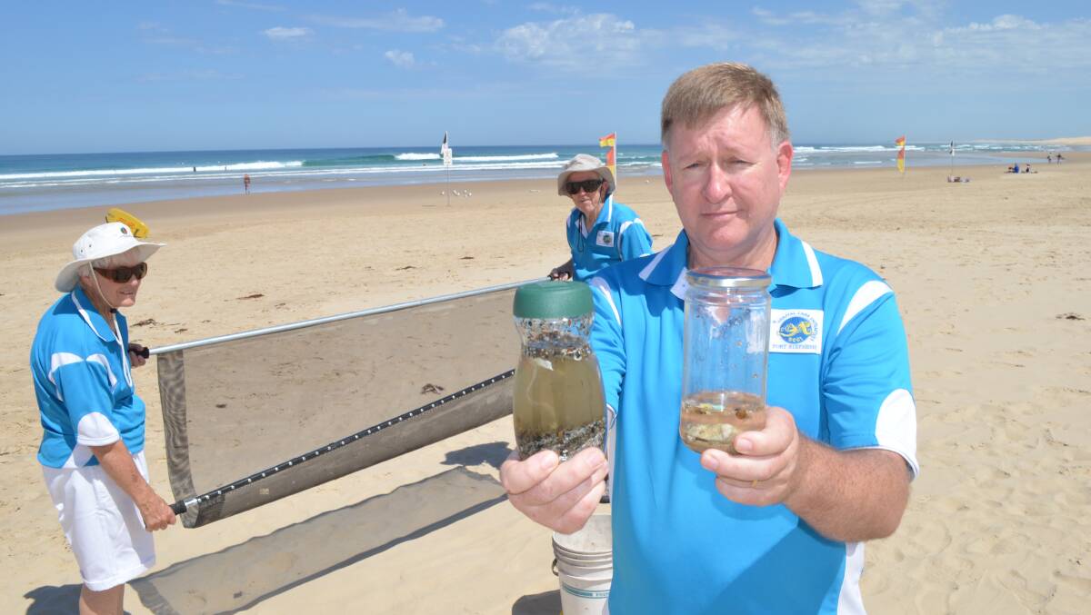 DEDICATION: Ocean and Coastal Care Initiatives Port Stephens vice president Keith Green with a sample of microplastics collected on Australia Day and a cleaner example from Birubi Beach. Picture: Sam Norris