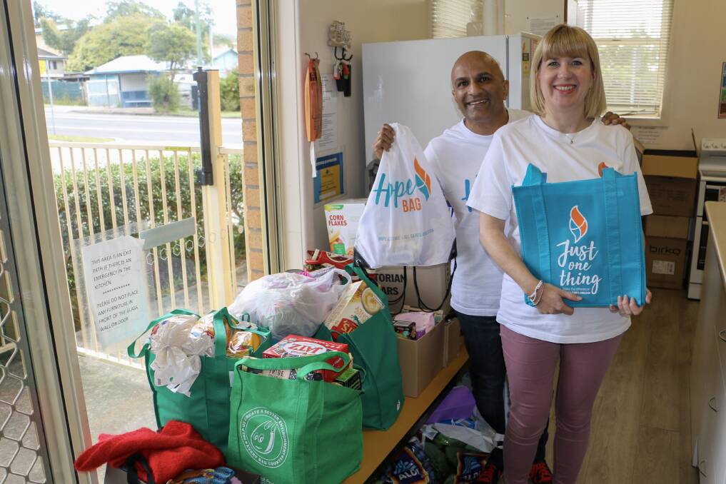 All Saints Anglican Church, Nelson Bay pastors Kesh and Catherine Govan with Hope Cottage donations.