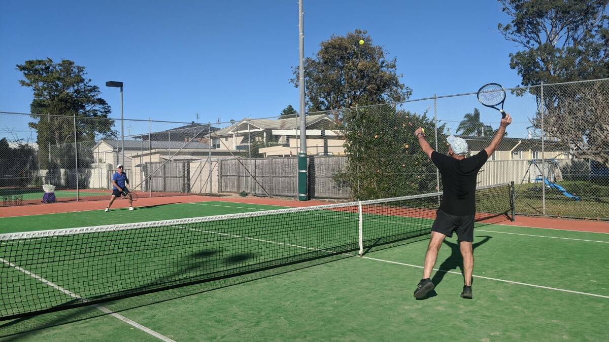 GAME ON: A singles match at Soldiers Point tennis courts earlier in August. The courts were reopened to the public for one-on-one games on Monday. Picture: Supplied