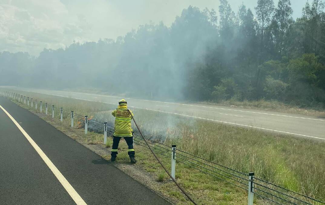 ADVICE: Rural Fire Service and Fire and Rescue NSW crews are responding to a fire burning to the north of Raymond Terrace which is impacting on the Pacific Highway. Picture: Facebook/Raymond Terrace Fire & Rescue