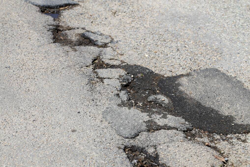 Potholes emerging in Sturgeon Street, Raymond Terrace.