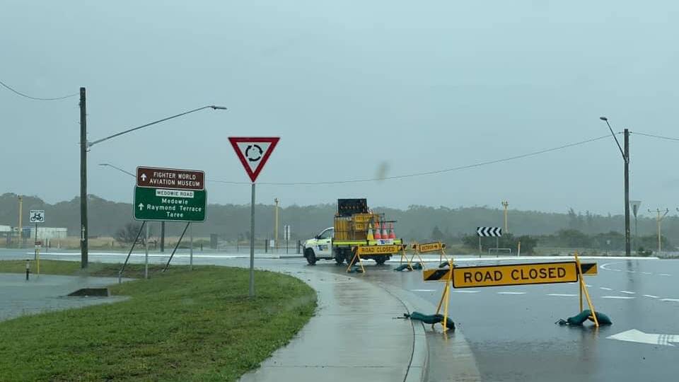 Medowie Road at the Nelson Bay Road roundabout in Williamtown, nearest the RAAF base, is closed. Picture: NBN News