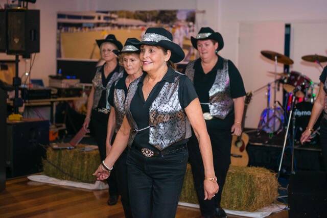 Bay Bootscooters in action at the festival launch at Nelson Bay Bowling Club on June 7. Picture: Man Down Media