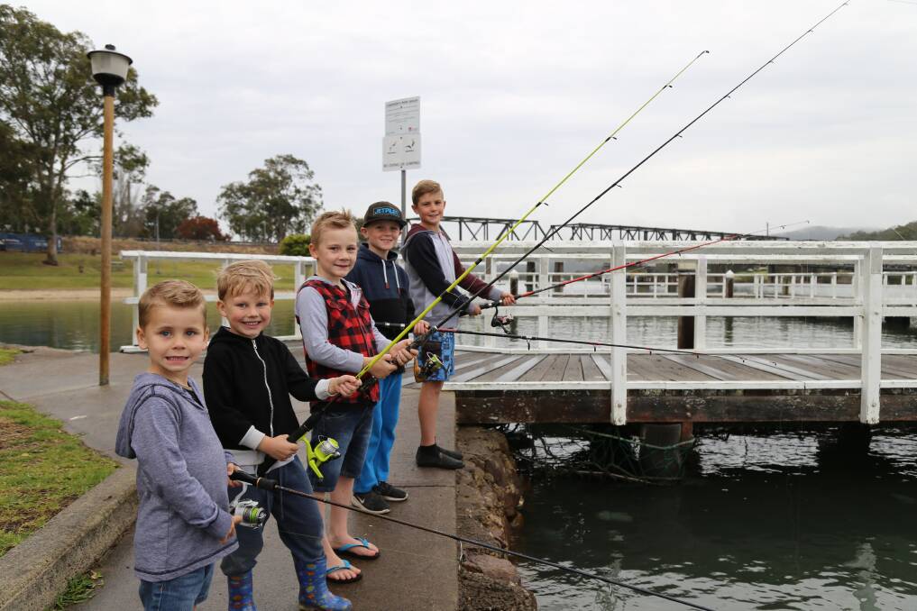 Kai Johnson, 4, Xavier Styles, 6, Ben Johnson, 7, Archer Watt, 7, and Cooper Watt, 11, fishing in Longworth Park where the Karuah Oyster and Timber Festival will be held on Saturday, October 20. Picture: Ellie-Marie Watts