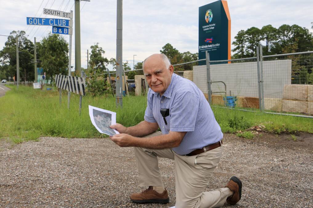 PROGRESS: Medowie resident John Donahoo with his pedestrian underpass proposal outside the new catholic high school at Medowie Road and South Street.