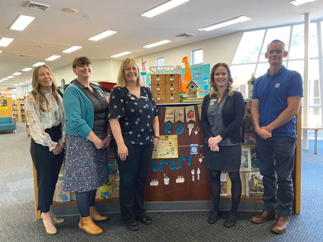 BORROW AND RETURN: Port Stephens Library's Kris Abbott, Melissa Donn, Mitzi Dewhurst, Jessica Roberts and James Norcross in front of the new Seed Library.