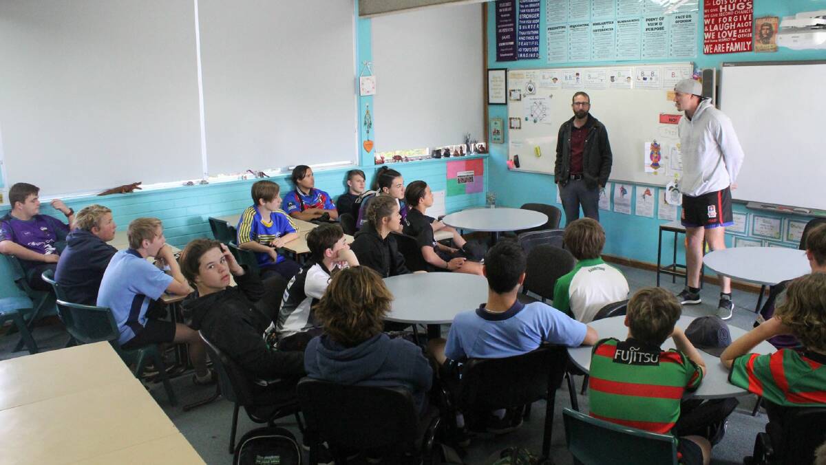 Newcastle Knights player Jack Stockwell visited Hunter River High School on August 18 to help support fund-raising for Riley Coburn-Hall. Here he is talking with Riley's year 8 class mates.