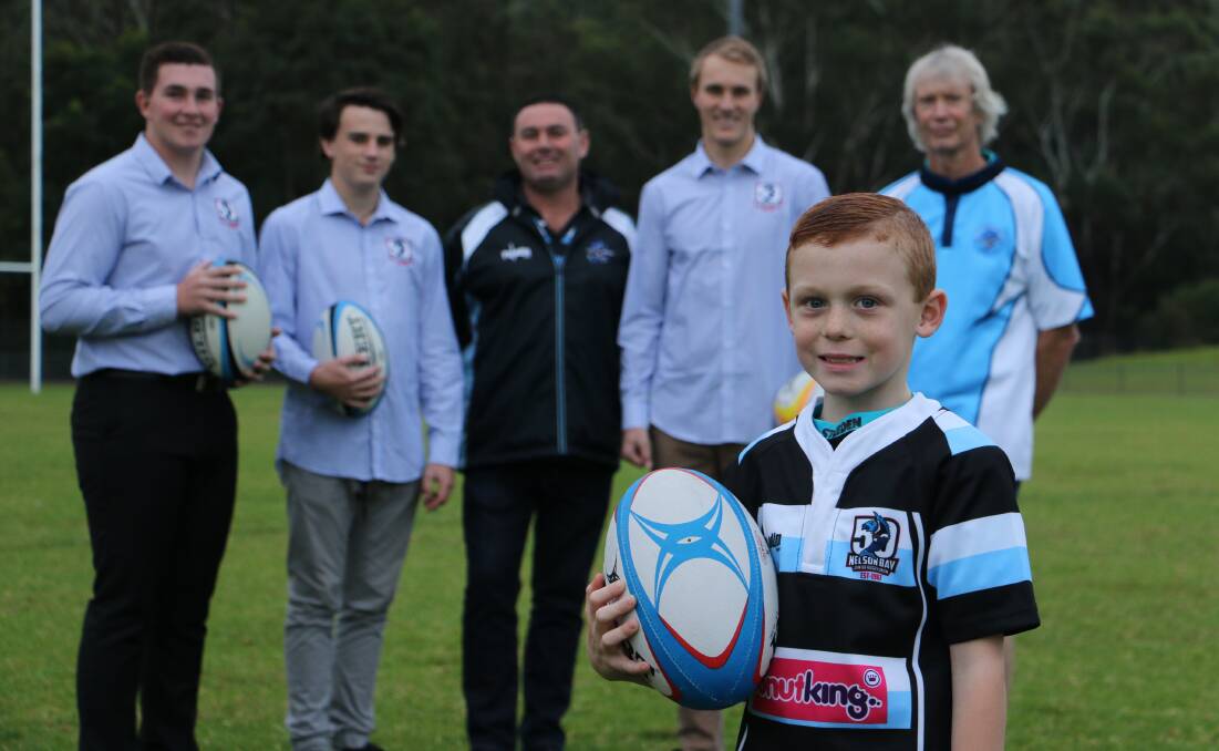 PROUD: Nelson Bay Gropers Junior Rugby members Izaac Musialik, 7, with (back) Jason Allwood, 16, Sam Cooper, 17, Dion Cooper, Charlie Fielder and John Killalea. Picture: Ellie-Marie Watts