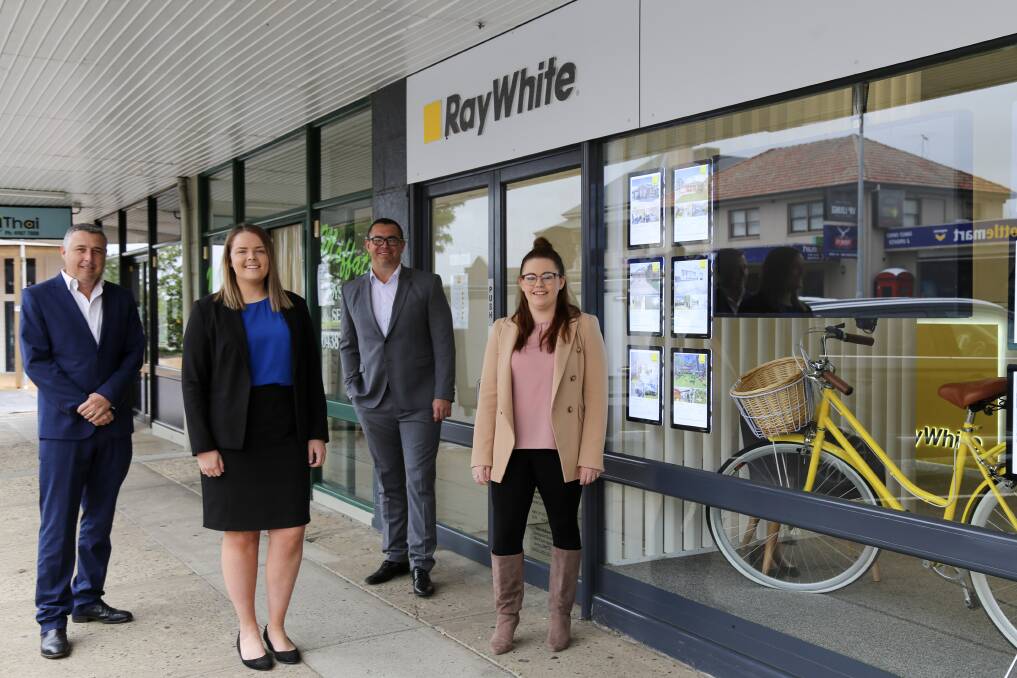 BUSY: The Ray White Raymond Terrace team: principals Mark McBaron and Ryan O'Connor with (front) sales associate Daisy Ekery and senior property manager Hayley Clark. Picture: Ellie-Marie Watts