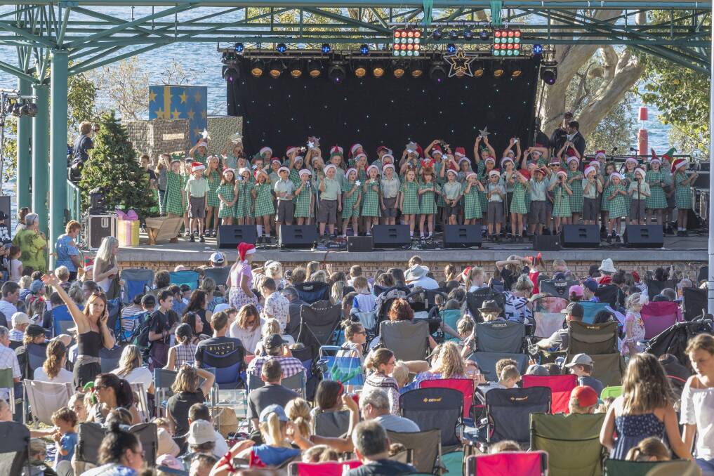 FA LA LA: Photo from Carols at the Bay in 2017. The hugely popular community Christmas event will return to Fly Point with COVID-Safe measures in place on Sunday, December 12. Picture: Henk Tobbe