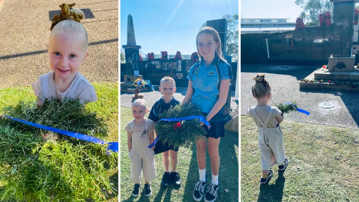 TRIBUTE: Siblings Lyla Green, 3, Rhylin Green, 6, and Emily Green, 12, laid a wreath at the Nelson Bay war memorial early on Sunday morning. Picture: Supplied