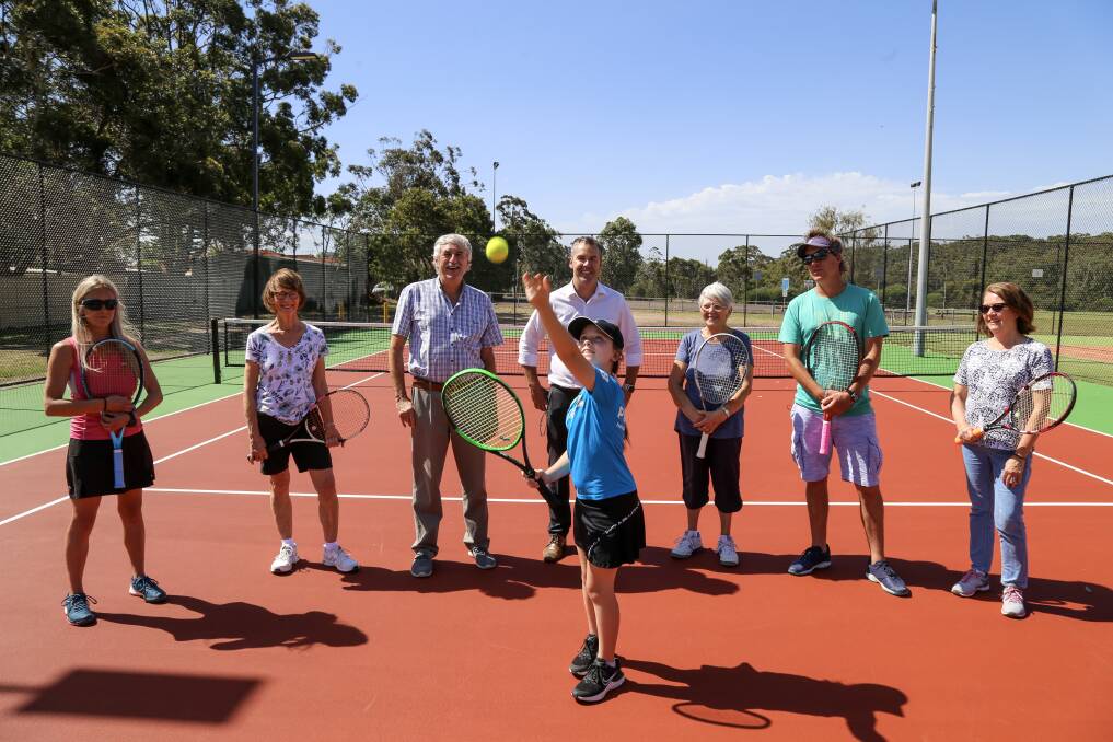 ACE: Olivia McLoughlin, 10, with Foreshore Tennis coaches, Tilligerry Tennis Club members and councillors Steve Tucker and Ryan Palmer. 