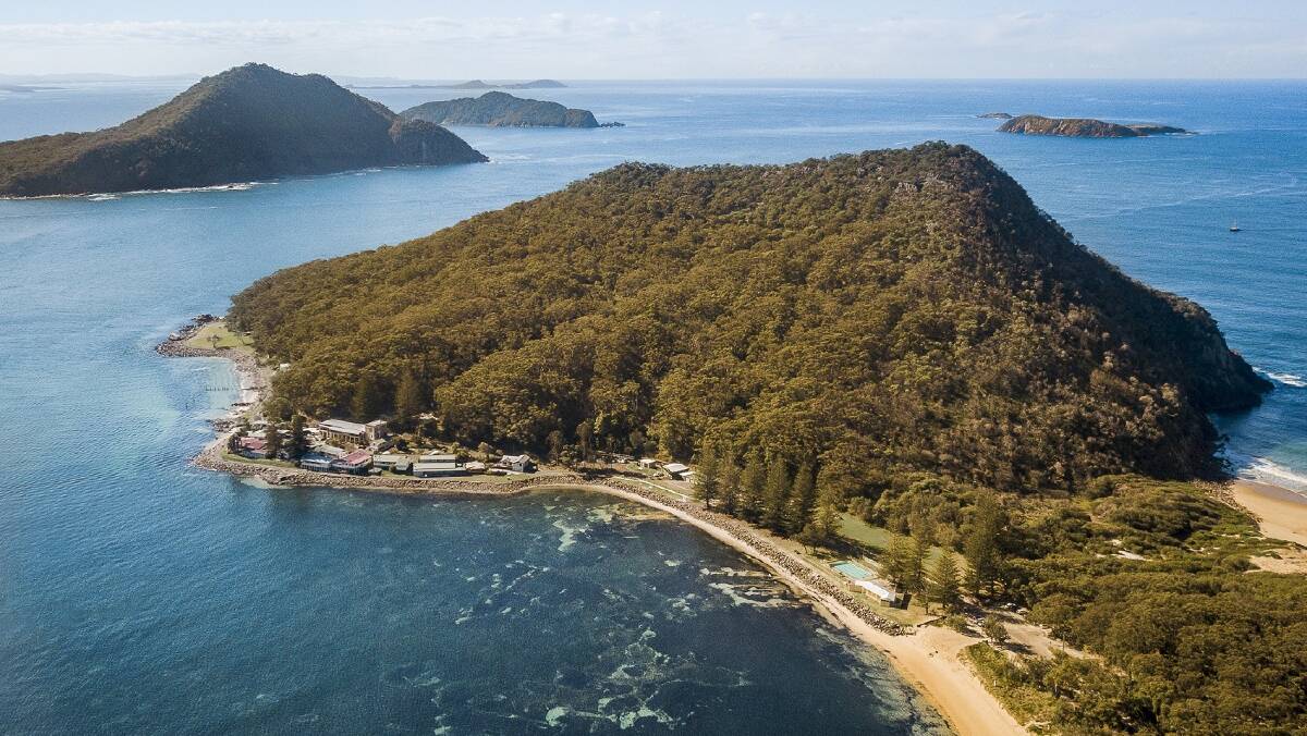 CLIMB UP: National Parks and Wildlife Service has reopened the Tomaree Head Summit Walk following extensive works to repair a landslip caused by the heavy rains in March. Picture: John Spencer/Department of Planning, Industry and Environment