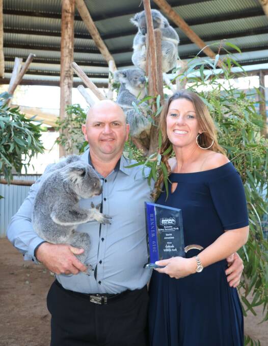 WELL DESERVED: Oakvale Wildlife Park owners Leanne and Kent Sansom with their Destination Sydney Surrounds North Regional Tourism Award for being the best tourism attraction in the area.