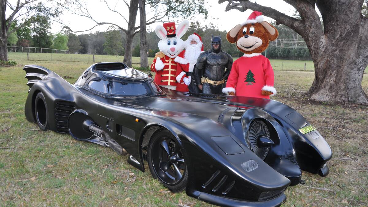 VISITOR: Santa is set to arrive in Raymond Terrace on November 12 in the Batmobile and surrounded by a parade of friends.