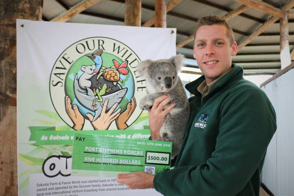 Oakvale Wildlife Park curator Lachlan Gordon. Port Stephens Koalas has received $500, donated through the park's Save Our Wildlife program.