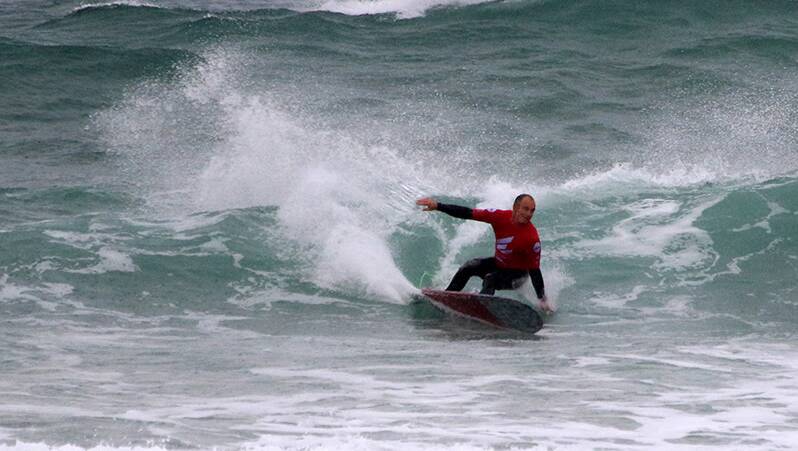 Multiple Australian title holder Jason Livingston (Curl Curl) showed why he is considered as one of the nation’s best longboarders by dominating the over-45 men's round one at One Mile Beach on Tuesday. Picture: Terry Day / Surfing NSW 