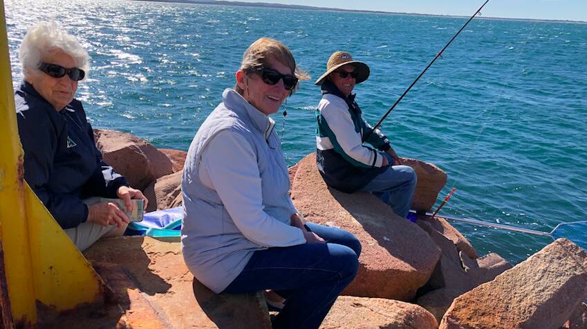 Mary Taylor, Val Spencer-Sun and Roy Gambell fishing in Corlette.