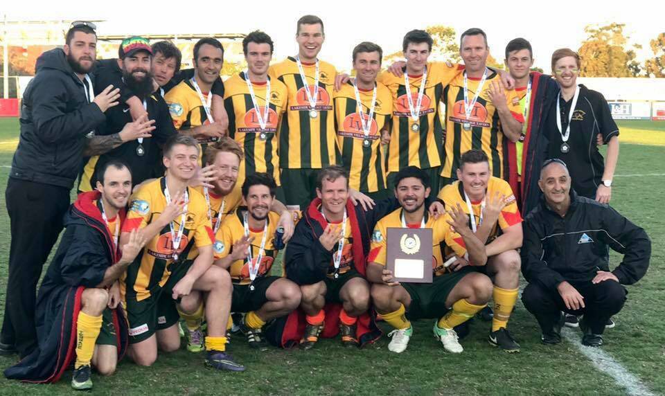 HARD FOUGHT: Raymond Terrace Soccer Club’s zone league one first grade team defeated Barnsley United in penalty shootout to claim the 2017 premiership. 