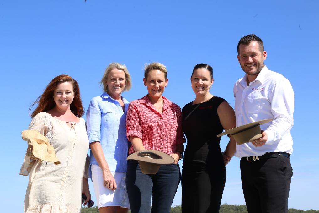 YEE-HAW: Bluewater organisers Chontelle Grecian and Anita Hutchinson with Tomaree Business Chamber president Leah Anderson, Michelle Smith and Josh Walker from Toyota.