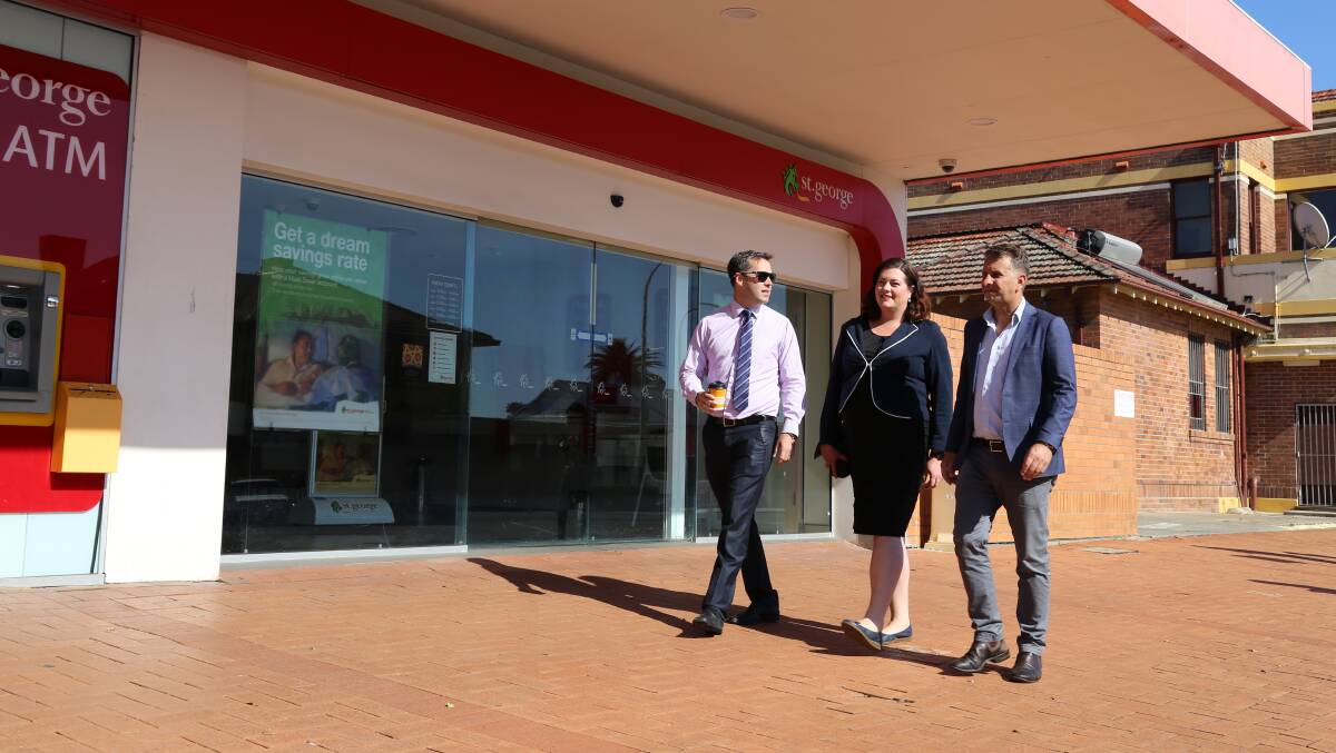 Port Stephens Mayor Ryan Palmer, Liberal candidate Jaimie Abbott and the Minister for Transport and Infrastructure Andrew Constance in Raymond Terrace on Monday morning.