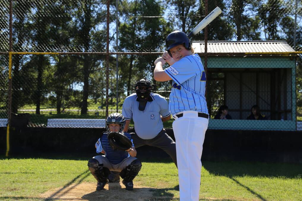 BATTER UP: Seaham Storm rookie Chad Lewis, 15, and catcher Rebecca Galbraith ready to play at Brandon Park. Picture: Ellie-Marie Watts