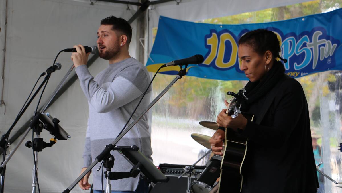 LOCAL TALENT: Jacob Ridgeway, from Raymond Terrace, and Kat Waria performing in the Stockton Street marquee on Saturday. Picture: Ellie-Marie Watts