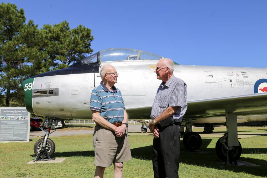 RAAF veterans Jim Treadwell and Don Newton who flew the two Sabres on display at Fighter World. Picture: Ellie-Marie Watts