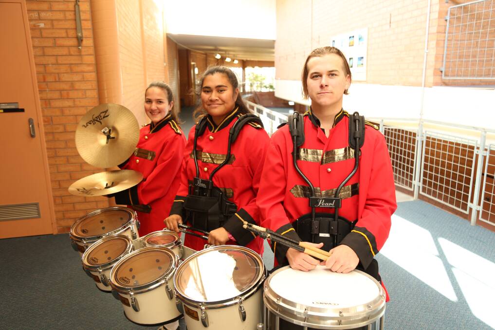 BORN THIS WAY: Holly Kennedy, 14, Jenny Tiamu, 17, and Matt Chaffey, 17, are part of Irrawang High School's drum corps, which is part of Showcase.
