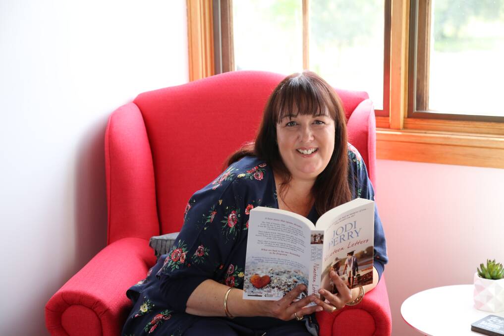 LOVE STORY: Brandy Hill author Jodi Perry has won Romance Writers Australia’s 2018 Romantic Book of the Year Award, affectionately known as the Ruby Award, for her 10th novel Nineteen Letters. Picture: Ellie-Marie Watts