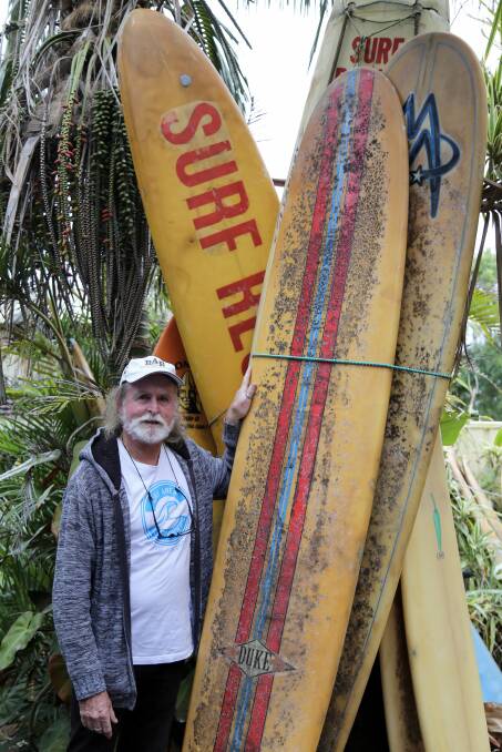 Mick Kershler with a small selection of his surf boards. He has more than 250 in his house and backyard.