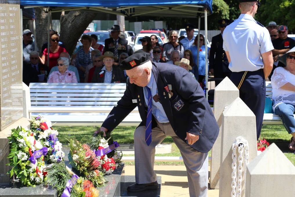 Kevin Jenkins from Port Stephens National Servicemen's Association laying a wreath at the 2018 Raymond Terrace service. Picture: Ellie-Marie Watts