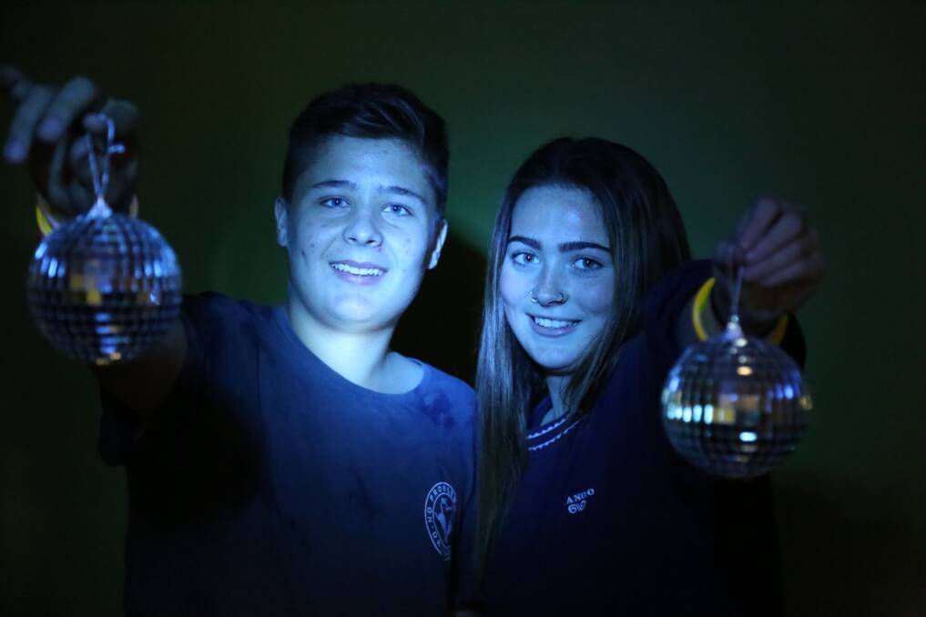 DISCO: Benji Mauldin and Jess Bradley, both 15, help to kick start the Blue Light fun at PCYC Port Stephens. Picture: Ellie-Marie Watts