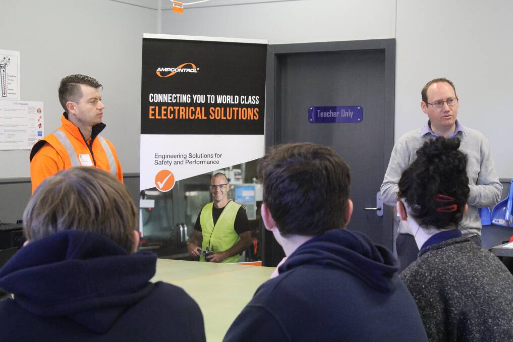 Students hear from Ampcontrol representatives during the June 26 open day.