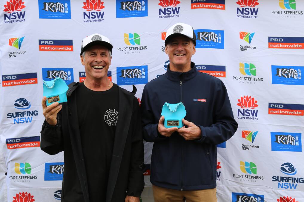 TOP EFFORT: Kaos Surf owner Tony Bainbridge and PRD Port Stephens principal Bruce Gair were presented trophies after the Port Stephens Toyota NSW Pro in thanks for sponsoring the PRD and Kaos Cadet Cup. Picture: Ellie-Marie Watts