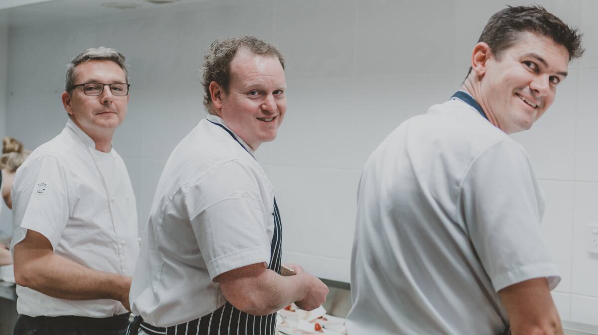 Chefs Ludovic Poyer (The Poyer’s), Ben Way (Little Beach Boathouse) and Matt Keyes (Little Nel Cafe) in the kitchen together during the 2017 Love Seafood festival. Picture: Supplied