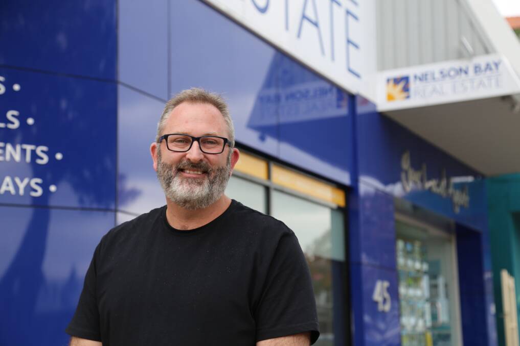 POSITIVE: Heath Jones, a 25-year veteran of the real estate industry and principal of Nelson Bay & Tilligerry Real Estate. Picture: Ellie-Marie Watts