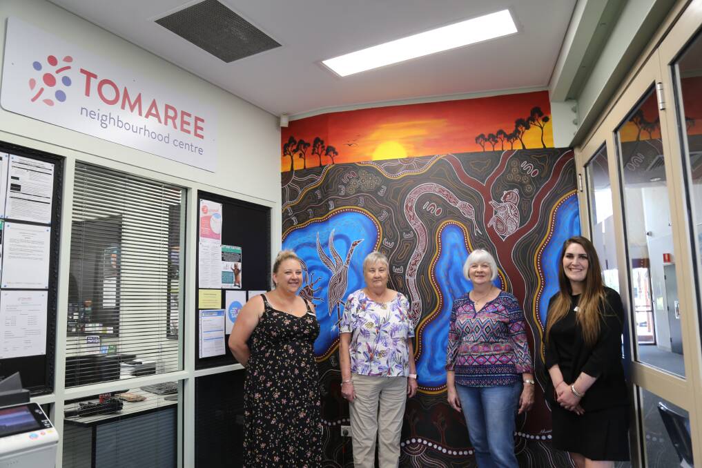 VIBRANT: The Tomaree Neighbourhood Centre team, from left: manager Georgina Scott, Jane Hearsum, Veronica Morrison and Clare Saunders in front of a mural painted as part of upgrades to the centre. Picture: Ellie-Marie Watts