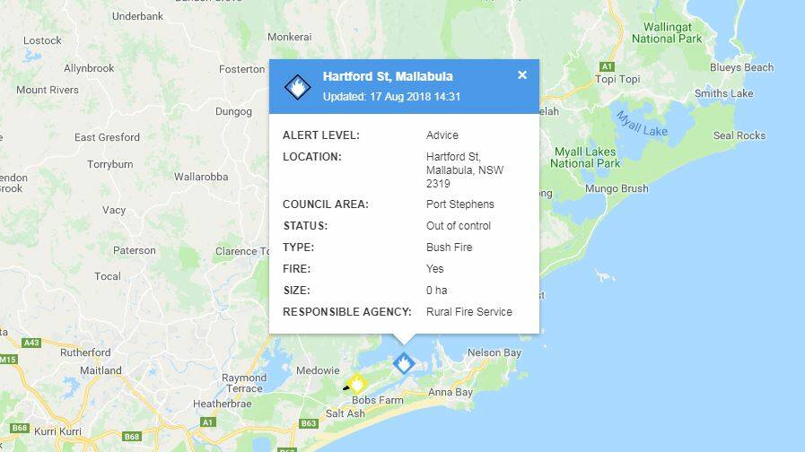 There are two out of control bushfires burning on the Tilligerry Peninsula - one at Salt Ash and the other at Mallabula