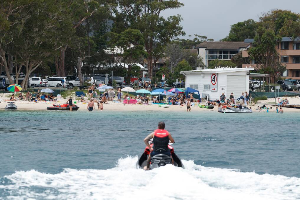 BE CONSIDERATE: A jet ski rider at Little Beach. NSW Maritime is reminding jet ski users to follow the riding rules this summer. Picture: Max Mason-Hubers