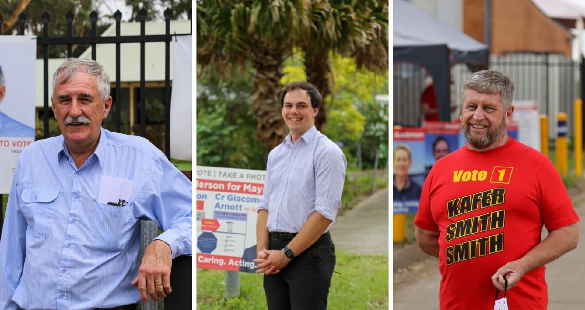 BACK IN: Steve Tucker and Giacomo Arnott, councillors from central and west ward, are almost certainly re-elected while prior west ward councillor Peter Kafer is expected to return. Trio pictured at voting booths on December 4.