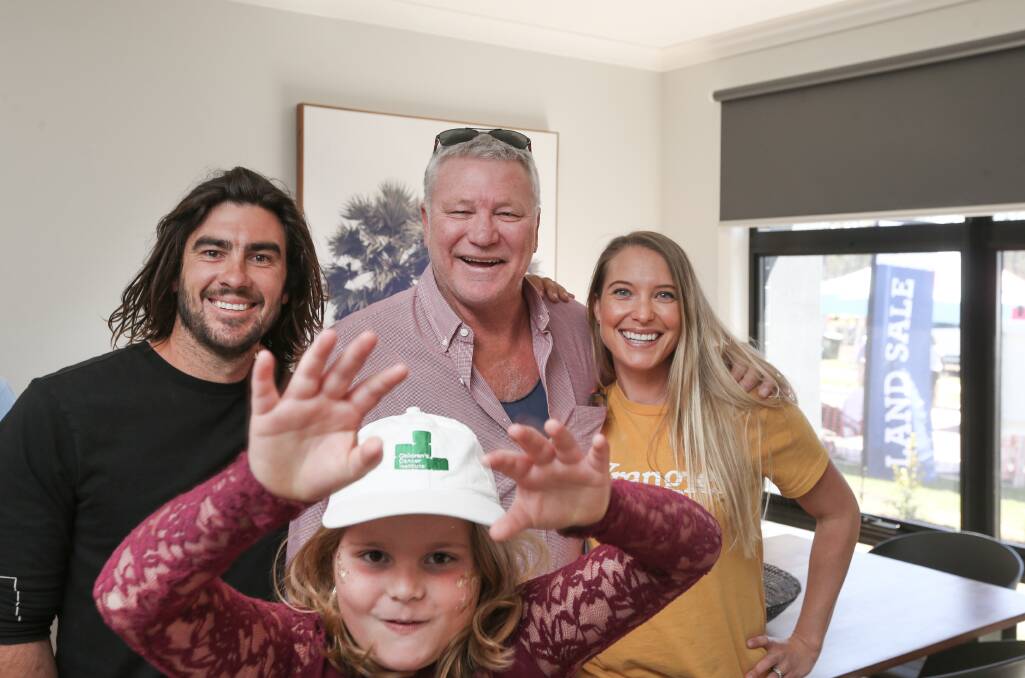 The Children's Cancer Institute's 'Build for a Cure' house was officially revealed on Sunday by ambassador Scott Cam. Crowds of interested buyers mixed with Cancer Council representatives and reality TV stars to view the Medowie home built in 21 days. Photos: Marina Neil