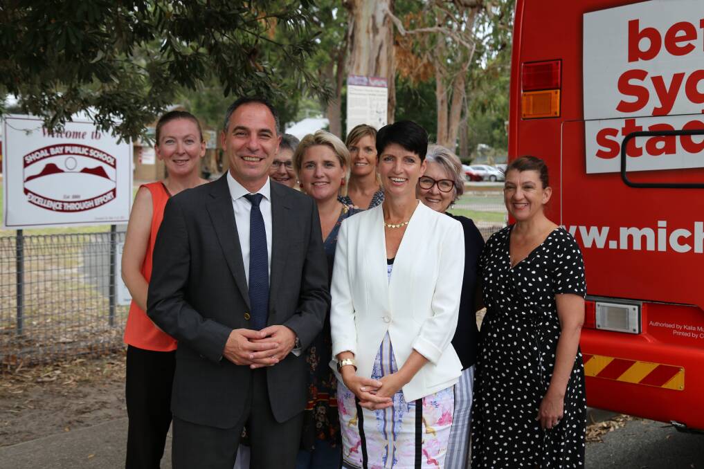 COMMITMENTS: Labor MPs Jihad Dib, the shadow minister for education, and Kate Washington with members of the Shoal Bay Public School P&C.
