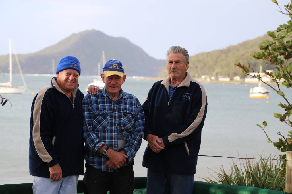 DETERMINED: Nelson Bay Blue Marlins Swimming Club members Brian Armstrong, Warren Diemar and Terry O'Brien at Shoal Bay where the club swims every Sunday at 9am. Picture: Ellie-Marie Watts