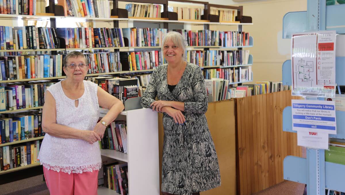Marcia Lancaster and Vicki Bailey, a library services officer, at Tilligerry Community Library.