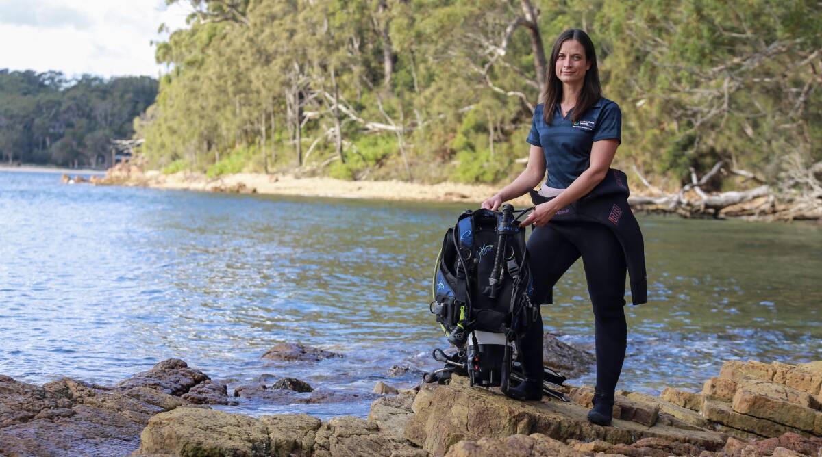 Meryl Larkin with her dive gear at Fly Point. Picture: Ellie-Marie Watts
