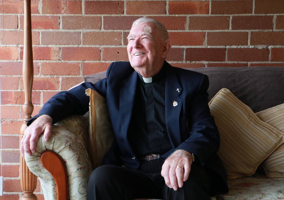 HONOURED: Reverend Frank Duffy, pictured at his home in Corlette, said he was "chuffed" to be receiving an OAM. Picture: Ellie-Marie Watts