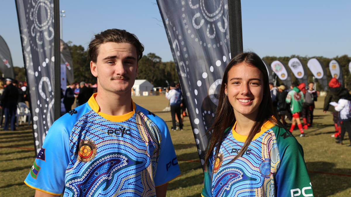 Worimi players Dean Langdon and Bree Chester at the 2018 Nations of Origin rugby sevens opening ceremony in Raymond Terrace on Wednesday morning. 