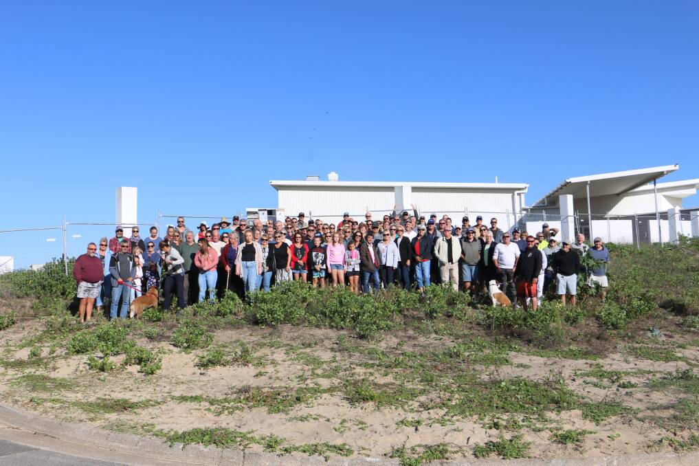 More than 100 people attended a gathering on Sunday morning to promote the community petition calling for action on the unsightly Anna Bay Resort.
