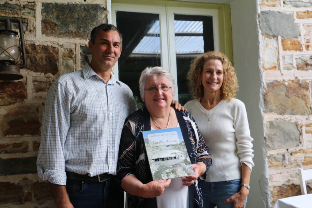 MILESTONE: Tanilba House owners Glenn Short and Deidre Hall with historian Denise Gaudion at the launch of History and Heritage of Tanilba House last year.